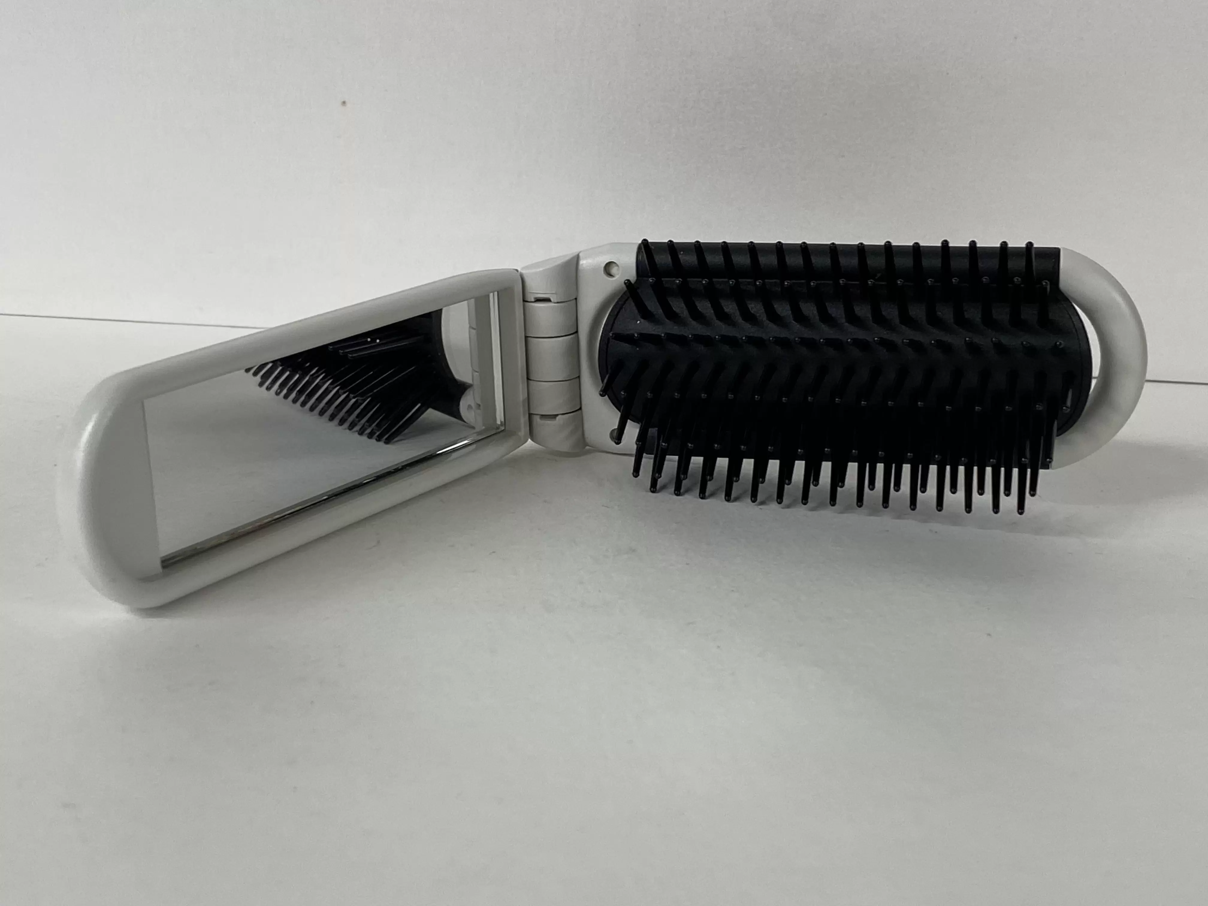 Folding Brush by Paul Mitchell for Travel & purse or pocket