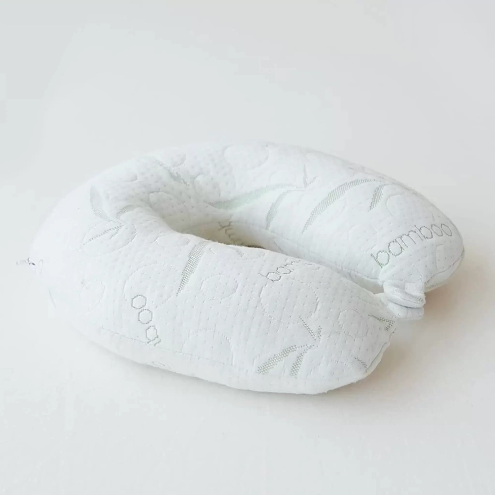 Sacred Thread Bamboo Travel Pillow - Head and Neck Support. For Airplanes. Cars. Buses. & Trains