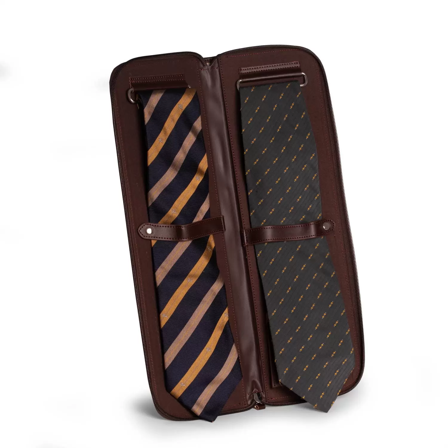 Cognac leather travel tie case with removable storage compartment.